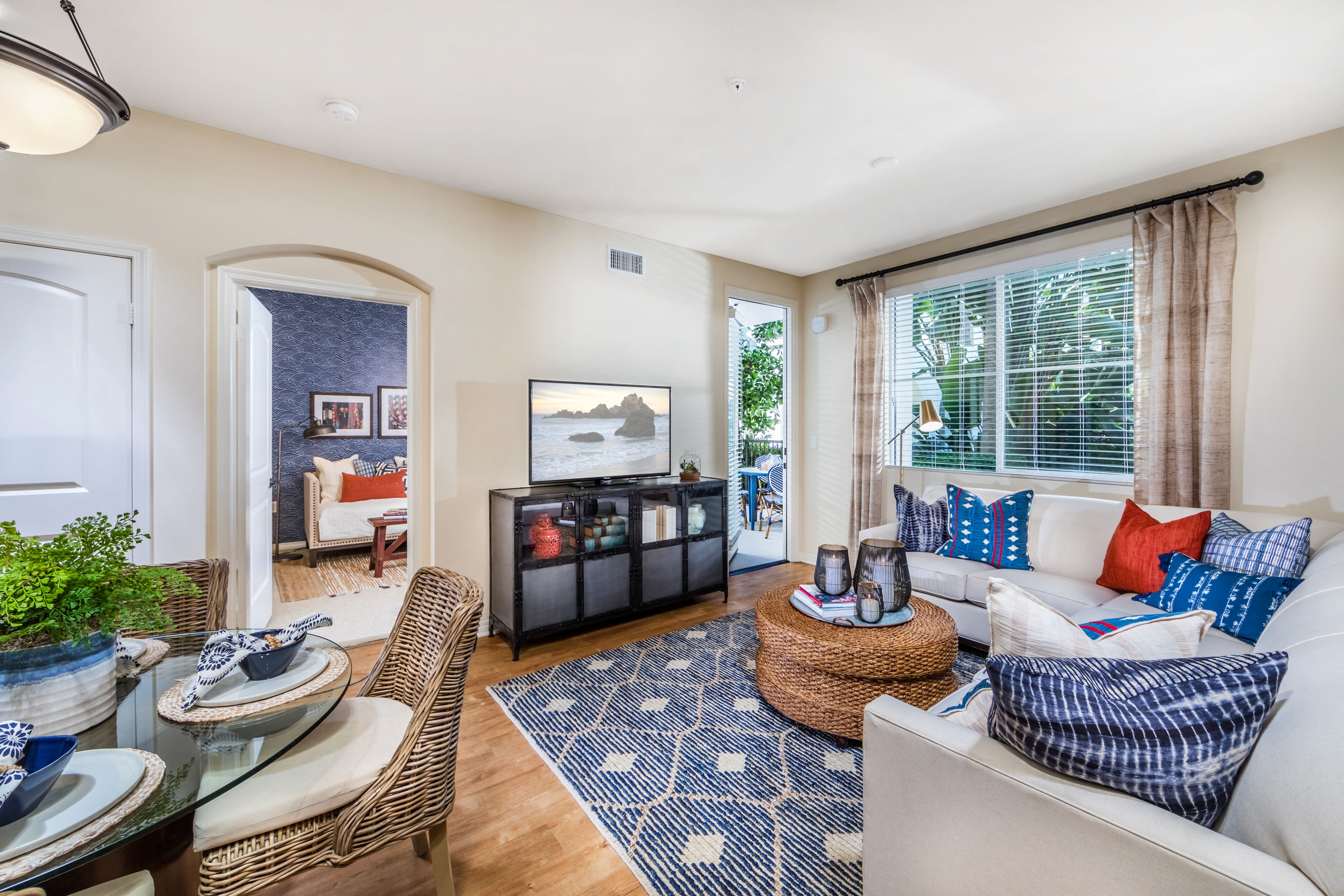 a living room with a couch and a table
